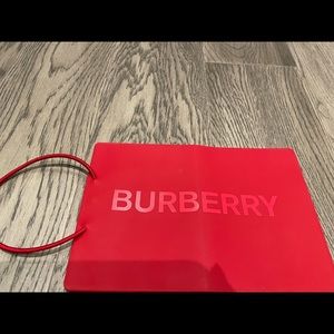 Authentic red Burberry passport cover